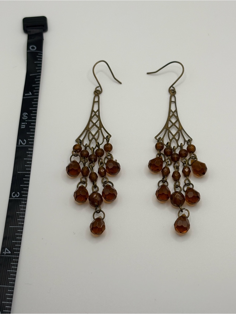 Vintage bronze tone dangly brown beaded chandelier style earrings